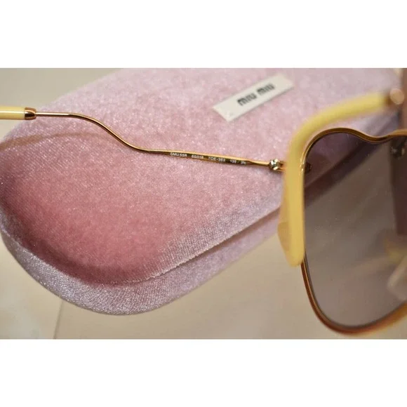 NIB MIU MIU SMU55R CAT EYES SCENIQUE GOLD YELLOW METAL LOGO FRAME SUNGLASSES NIB MIU MIU SMU55R CAT EYES SCENIQUE GOLD YELLOW METAL LOGO  main image 2